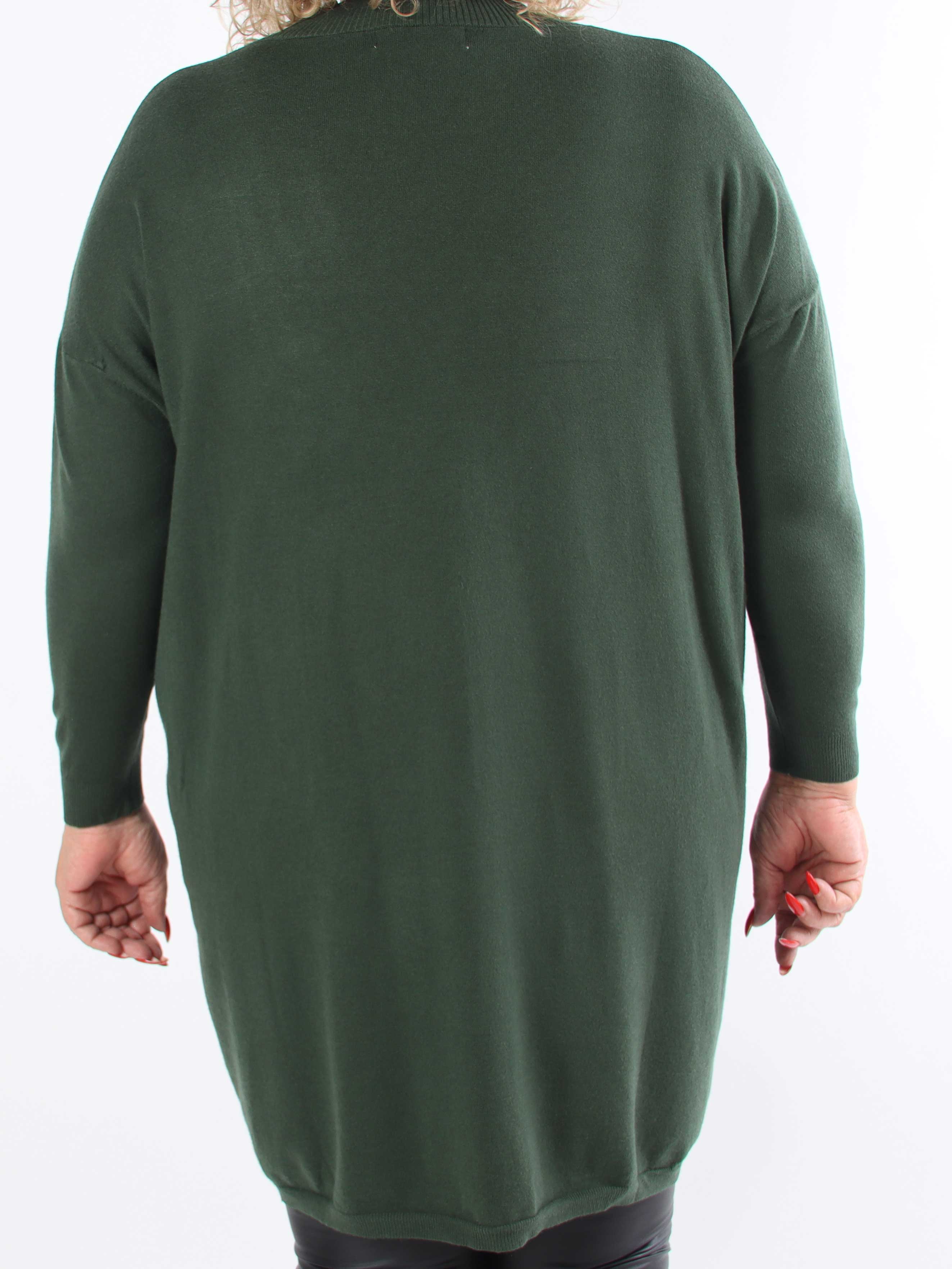 Dima - Mjuk stickad klänning i plus size med fickor